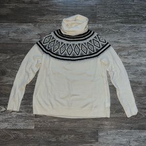 Barely worn, black, white, and silver chevron patterned light sweater